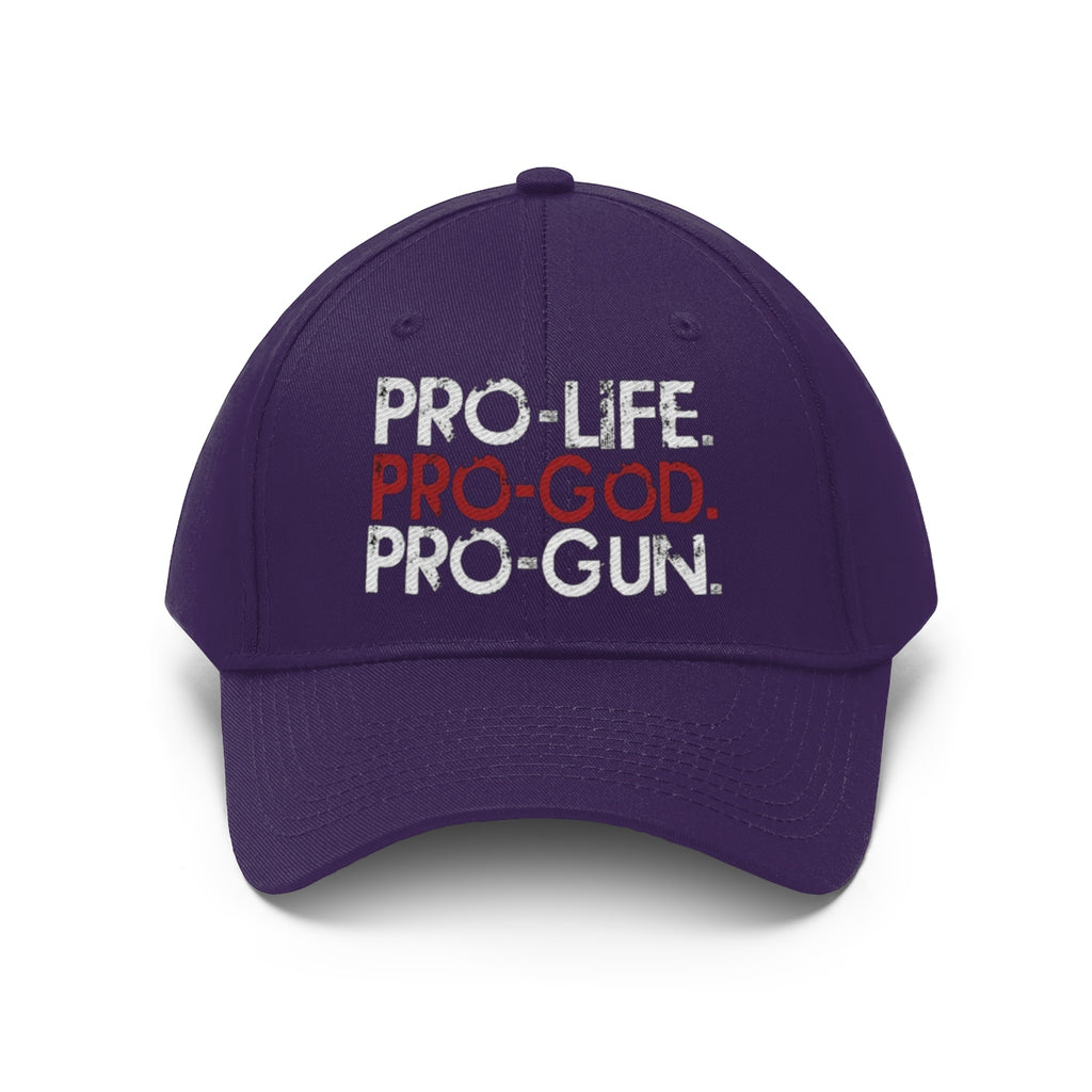 Pro-Life Pro-God Pro-Gun Cotton Twill Cap displayed on a stylish purple cap showcasing classic core-values message.