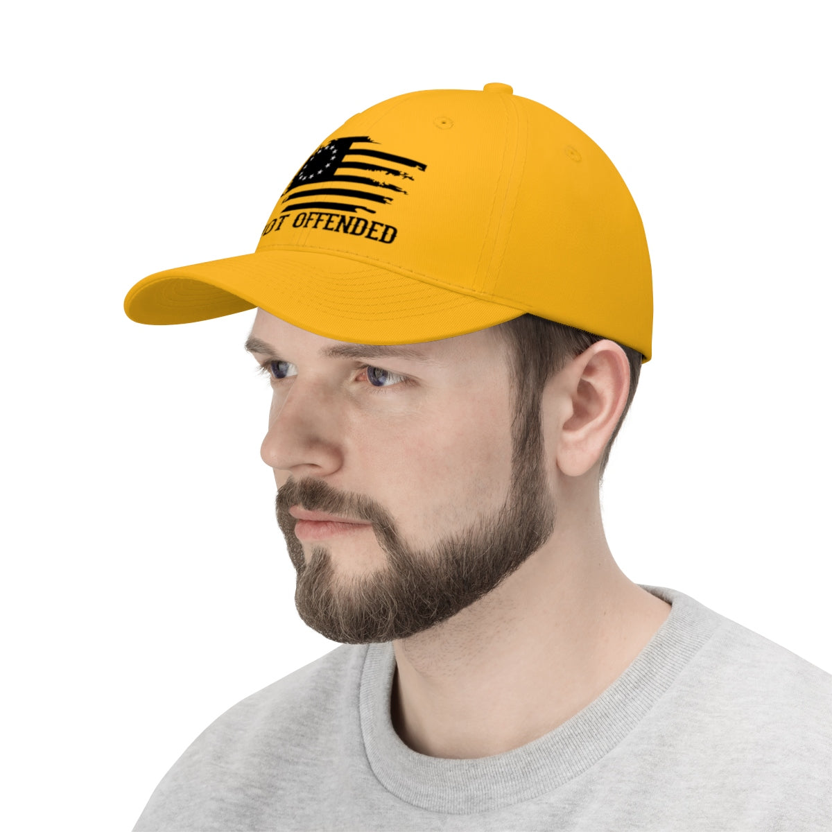 Embroidered Not Offended Casual Twill Hat in yellow worn by a man, featuring a bold design.
