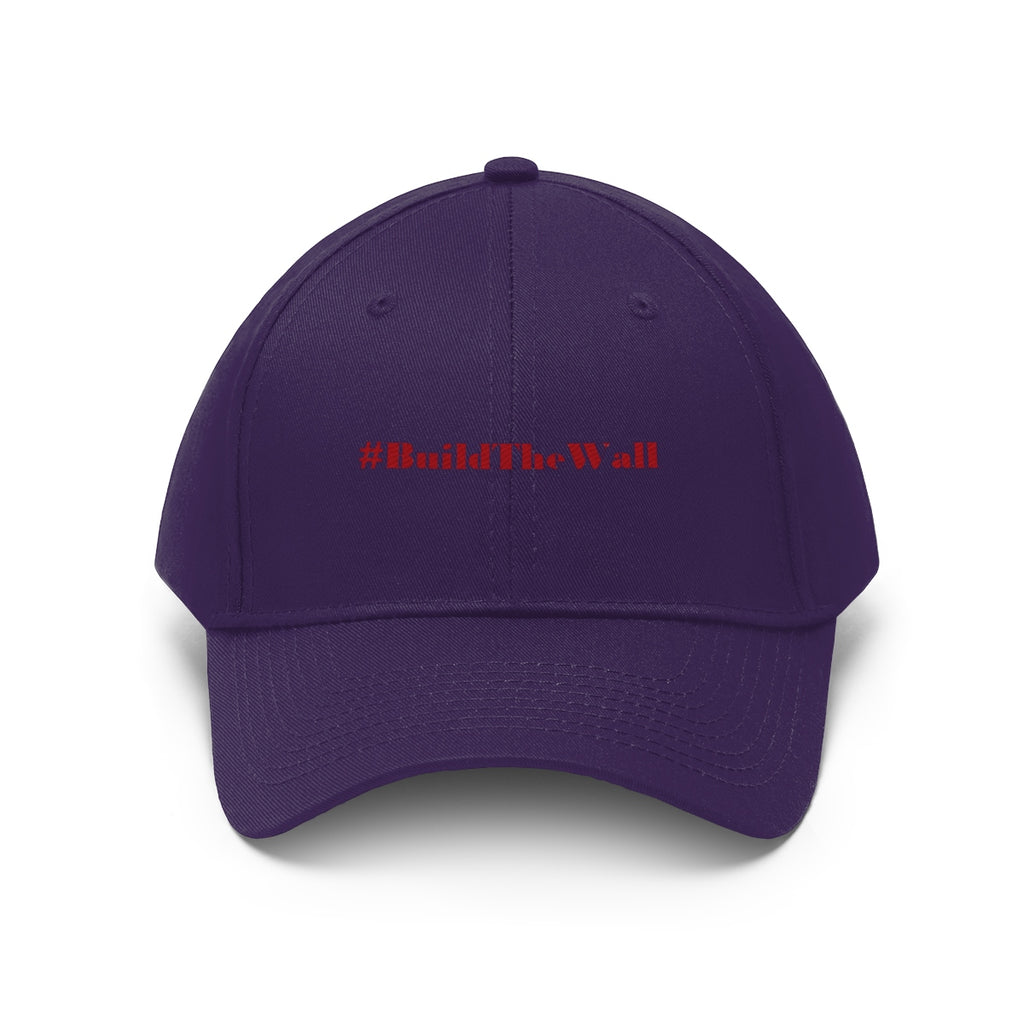 Build The Wall Embroidered Cotton Twill Cap featuring #BuildTheWall in bold red on a purple background.