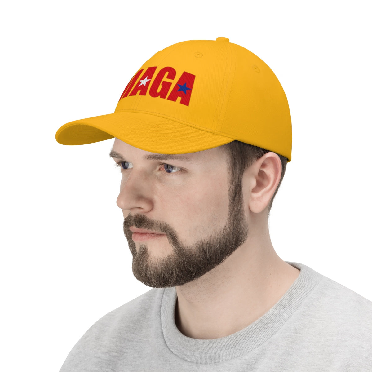 Embroidered MAGA Cotton Twill Cap Design worn by a man, showcasing a bold political style with vibrant colors.