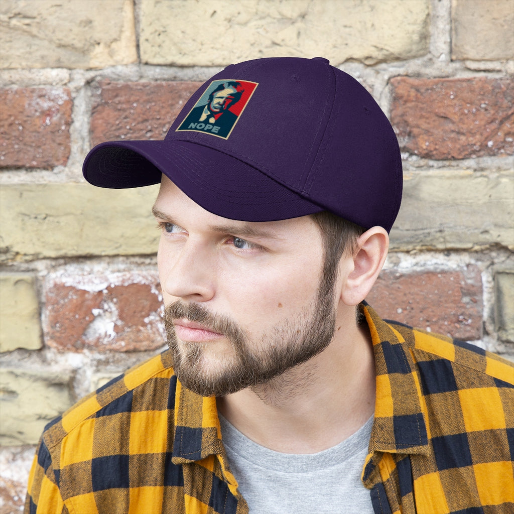 Vintage Nope Baseball Cap Inspired by Trump worn by man with beard and plaid shirt against brick wall.