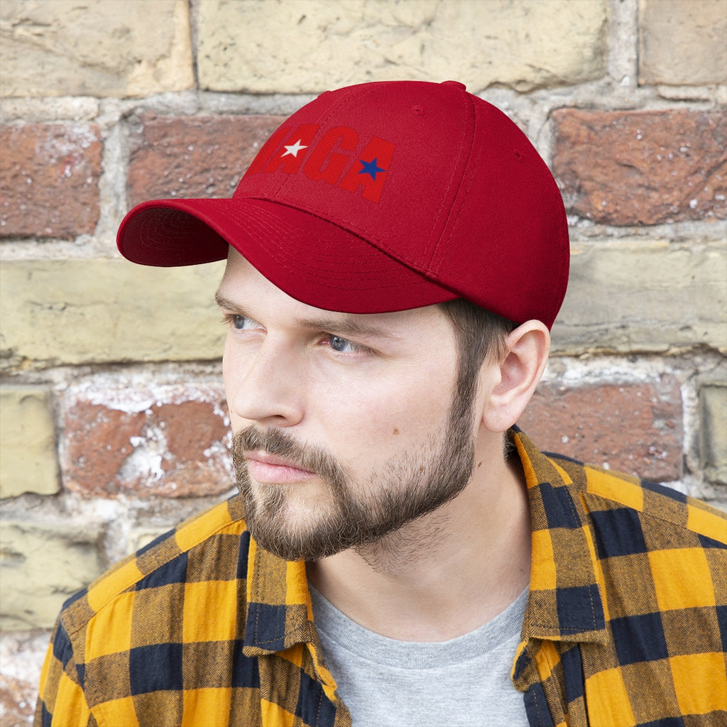 Embroidered MAGA Cotton Twill Cap Design worn by a man with a beard and plaid shirt against a brick wall.
