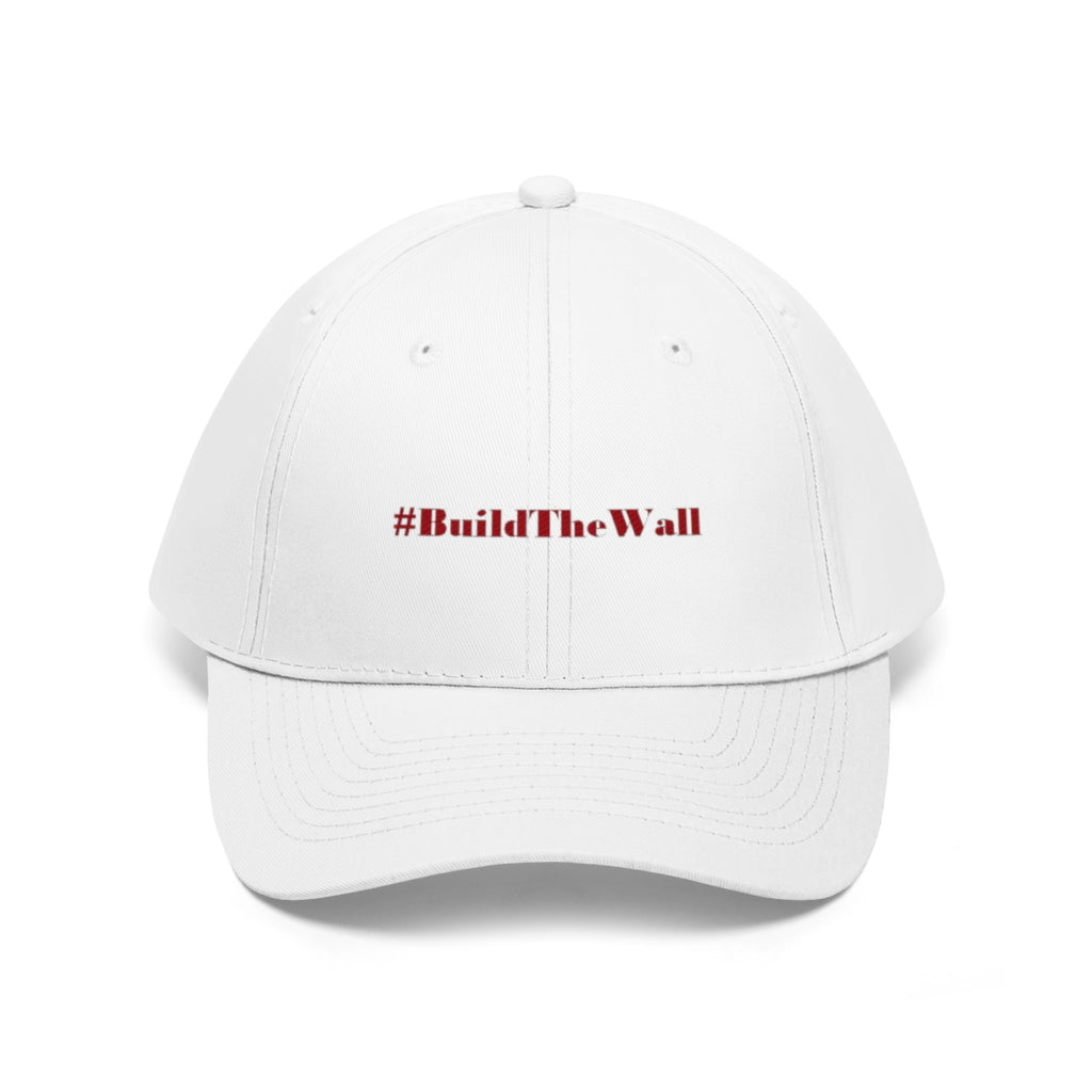 Build The Wall Embroidered Cotton Twill Cap featuring #BuildTheWall slogan on a white cap.