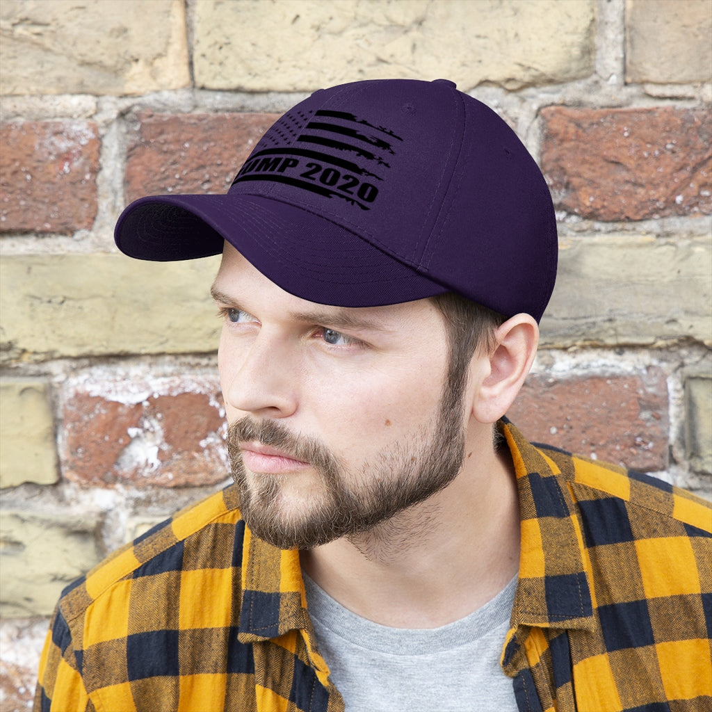 A man wearing a 2020 Twill Cap Trump Bold Supporter Cap with a patriotic design.