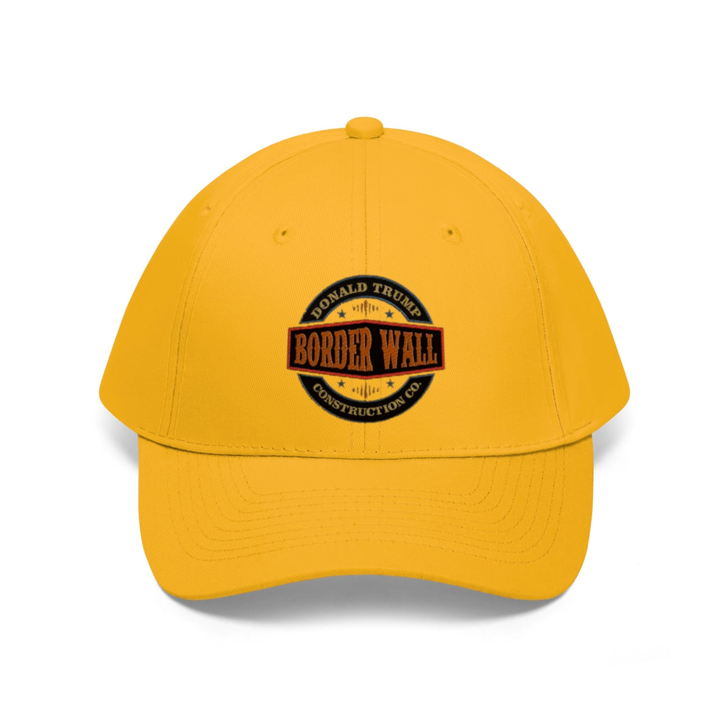 Classic Border Wall Twill Cap Donald Trump in yellow with bold construction logo on the front.