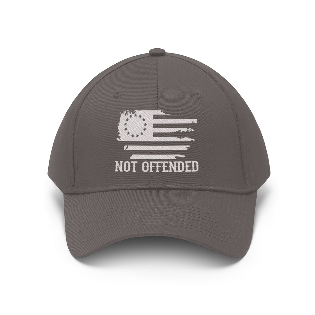 Embroidered Not Offended Adjustable Twill Cap with a flag design and bold 'NOT OFFENDED' text on the front.