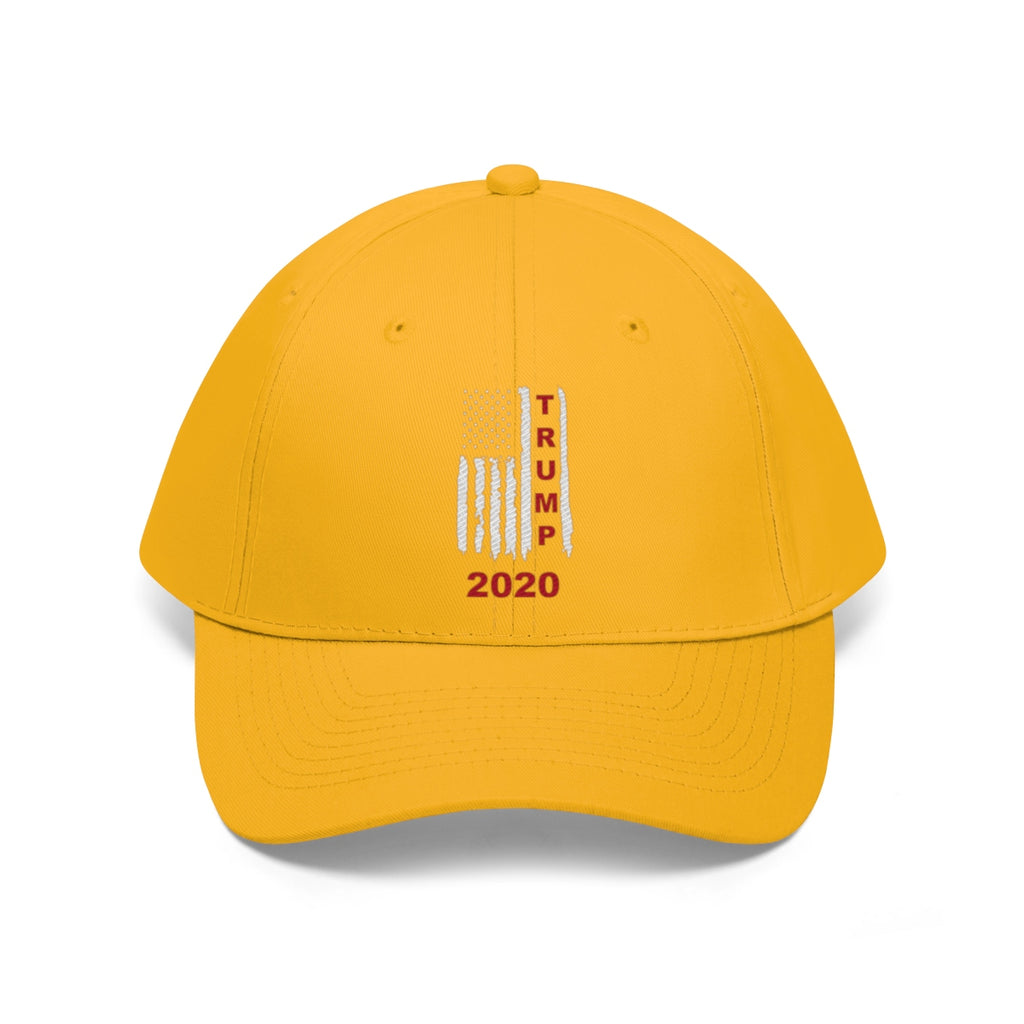 Trump 2020 Red On Distressed American Flag Twill Cap featuring bold 'TRUMP 2020' design on a bright yellow hat.