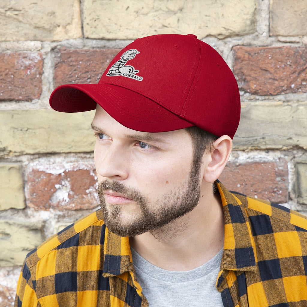 Trump USA Pride Embroidered Twill Cap worn by man against a brick wall, showcasing patriotic design features.