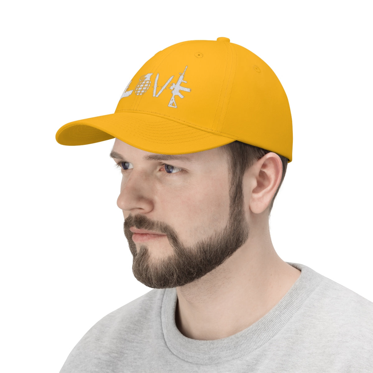Love Combat Inspired Street Style Twill Cap in vibrant yellow worn by a man with a beard.