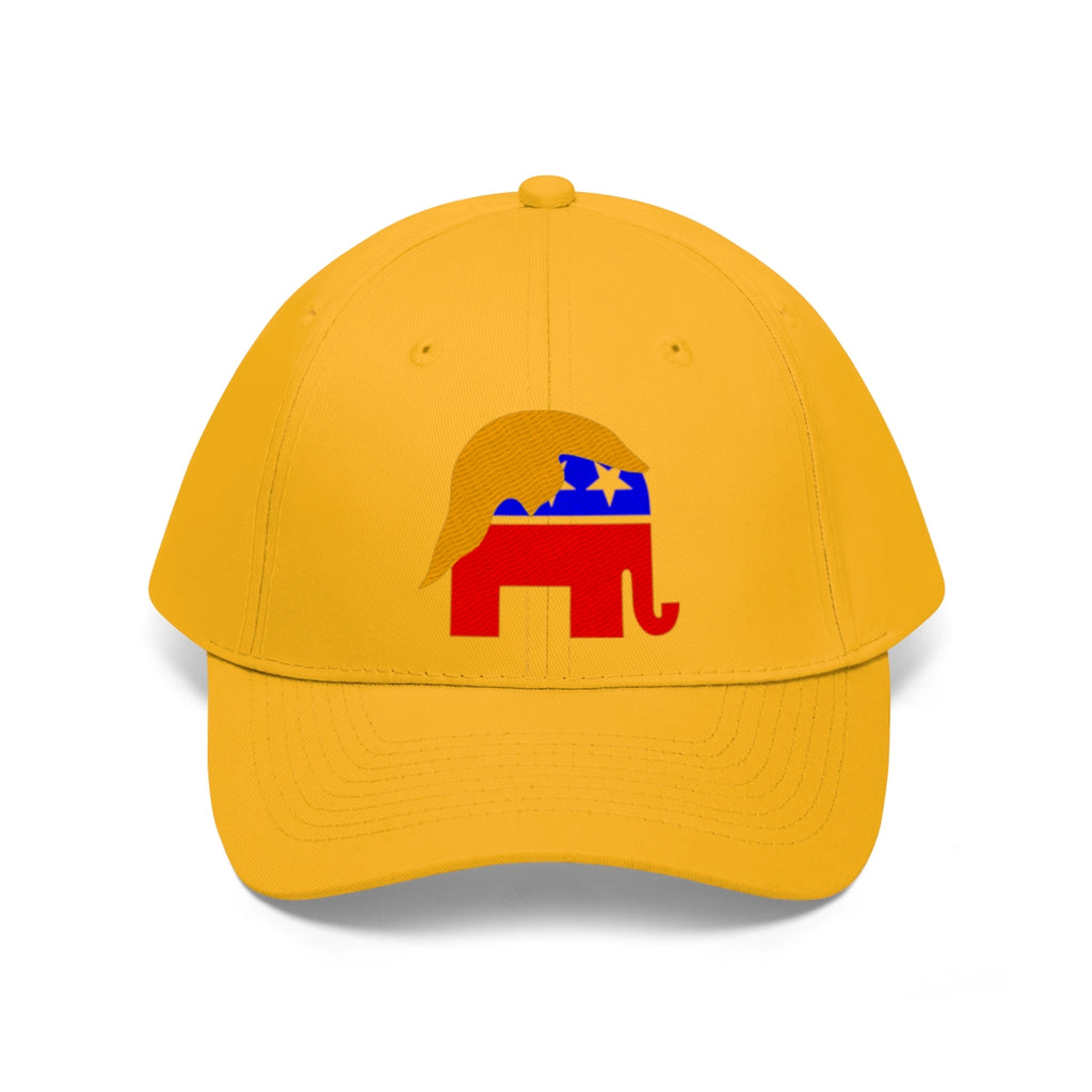 GOP Symbol With Trump Hair Twill Cap featuring a red elephant and blonde hair design on a yellow hat.