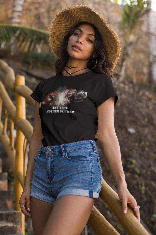 Model wearing Any Time Mother Fucker American vs Soviet Boxing Gloves t-shirt with denim shorts and straw hat.