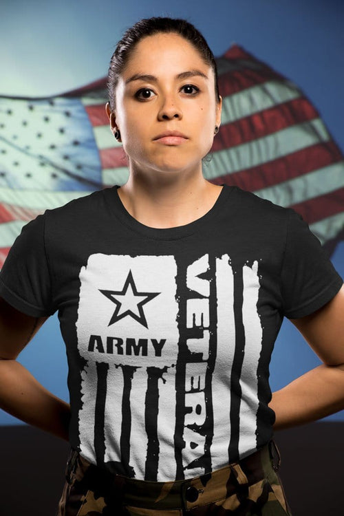 Person wearing black shirt with 'Army Veteran Flag With Soldier Silhouette' design and American flag in the background.