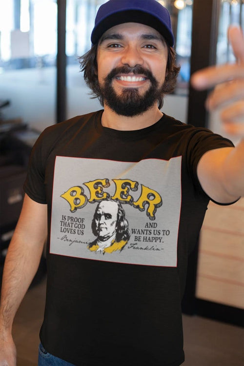 Man wearing Beer Is Proof God Loves Us Funny Ben Franklin Quote Tee in casual setting.