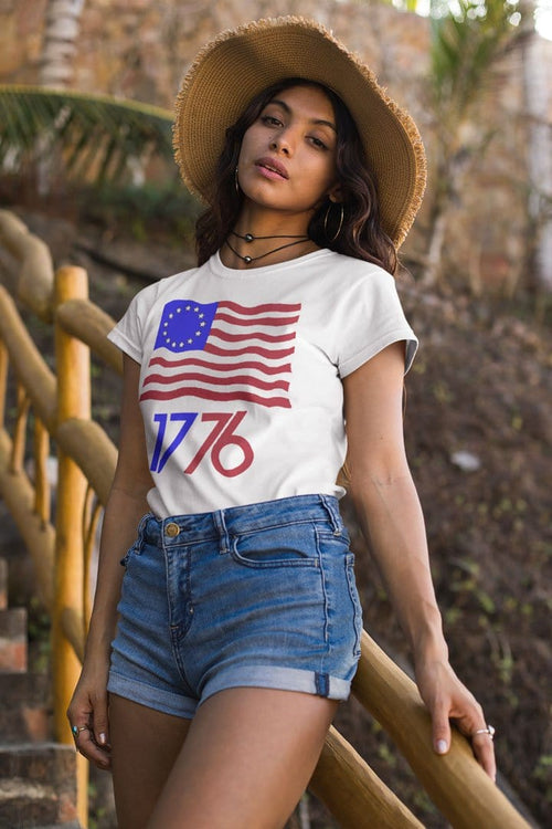 Woman wearing Betsy Ross Flag 1776 Graphic Tee outdoors
