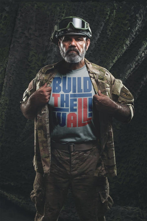 Man wearing Build The Wall Bold Political Statement Graphic Tee Shirt