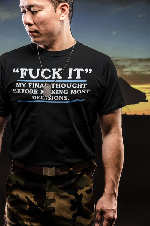 Man wearing conservative statement t-shirt with bold text, sunset background
