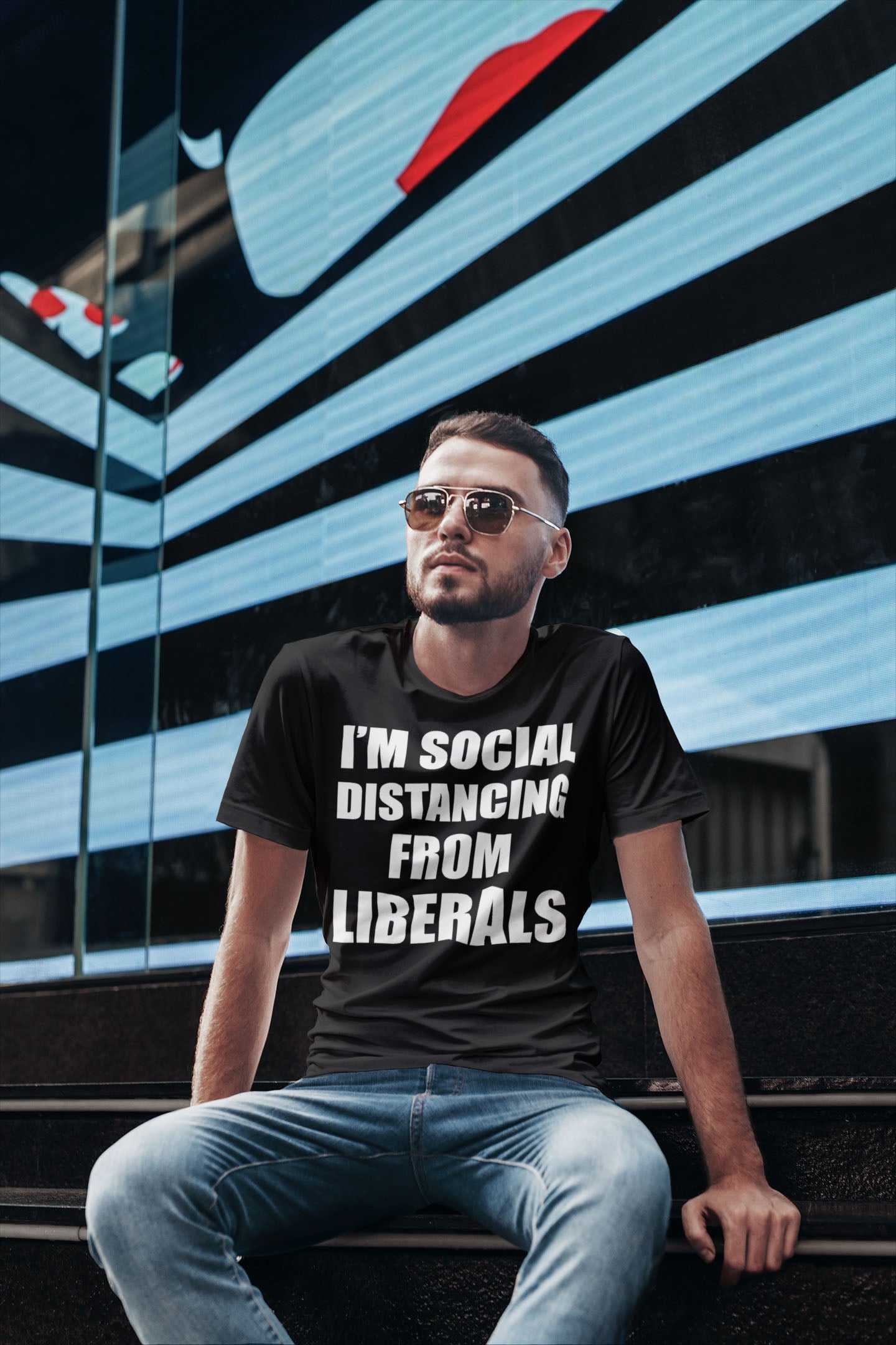 Man wearing I'm Social Distancing From Liberals t-shirt with street art background