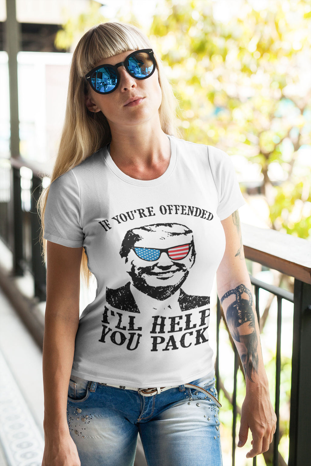 Woman wearing Trump USA Glasses Patriotic Graphic Tee with political imagery and American motifs.