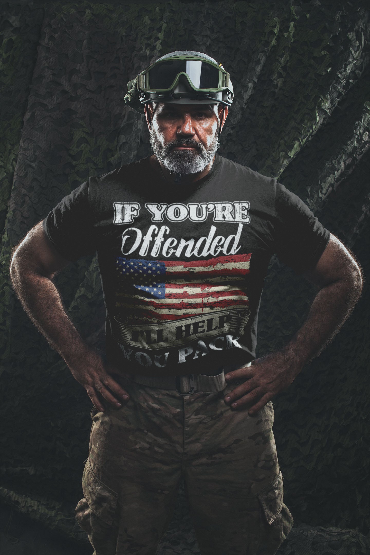 Man wearing Bold Statement Humor Graphic Tee with American flag and text in a confident pose, camo background
