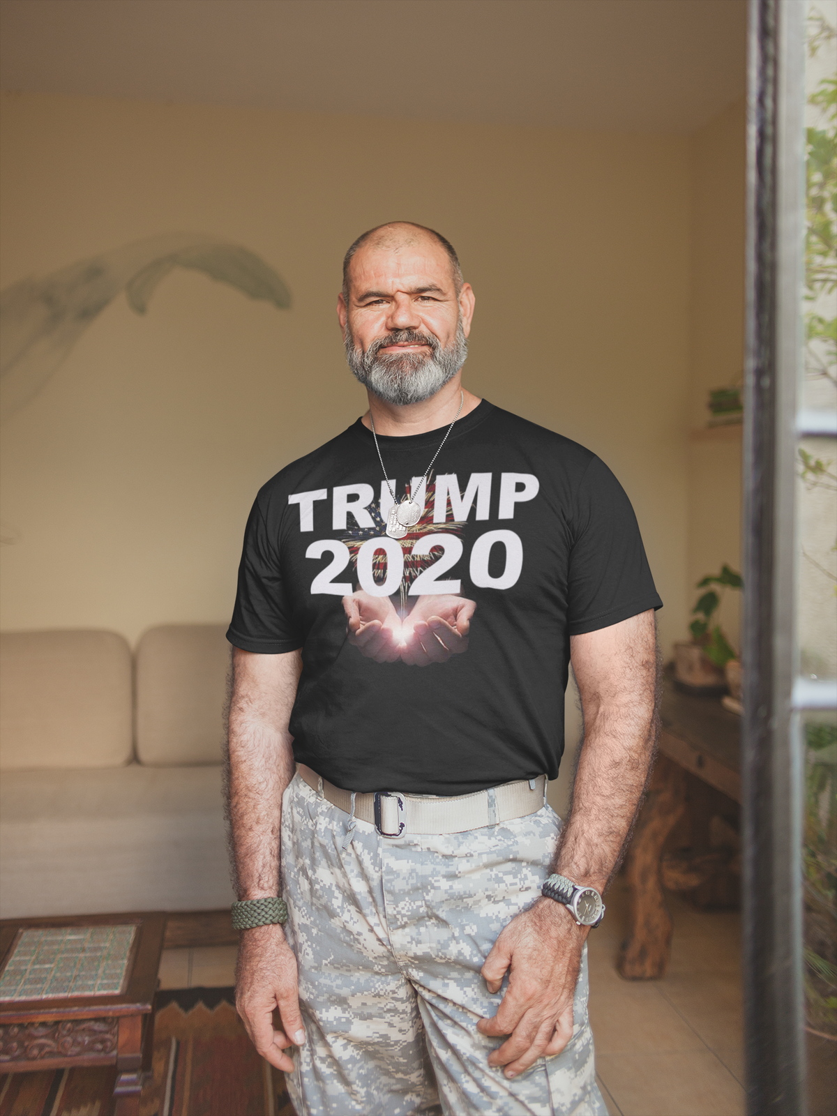 Man wearing Trump 2020 Heavenly Hands Patriotic Tee with symbolic imagery of raised hands.