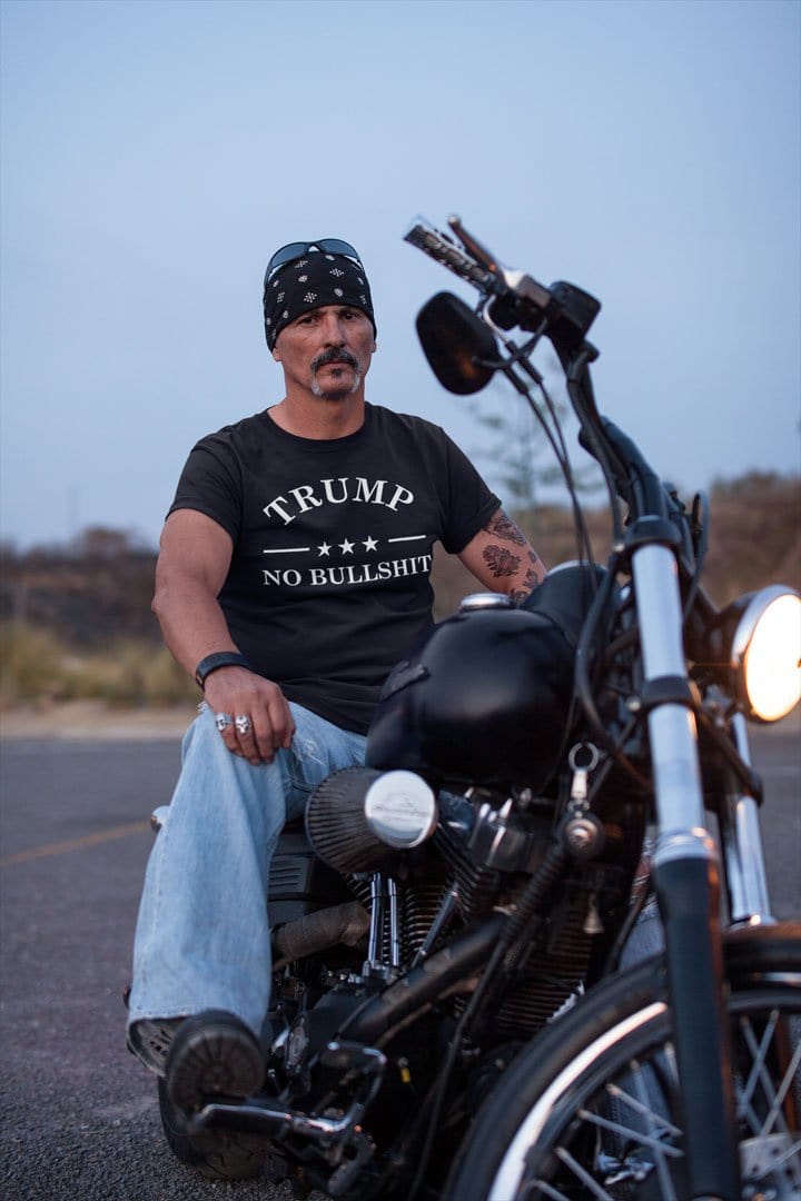 Man wearing No Bullshit Trump Bold Honest Message Graphic Tee on motorcycle
