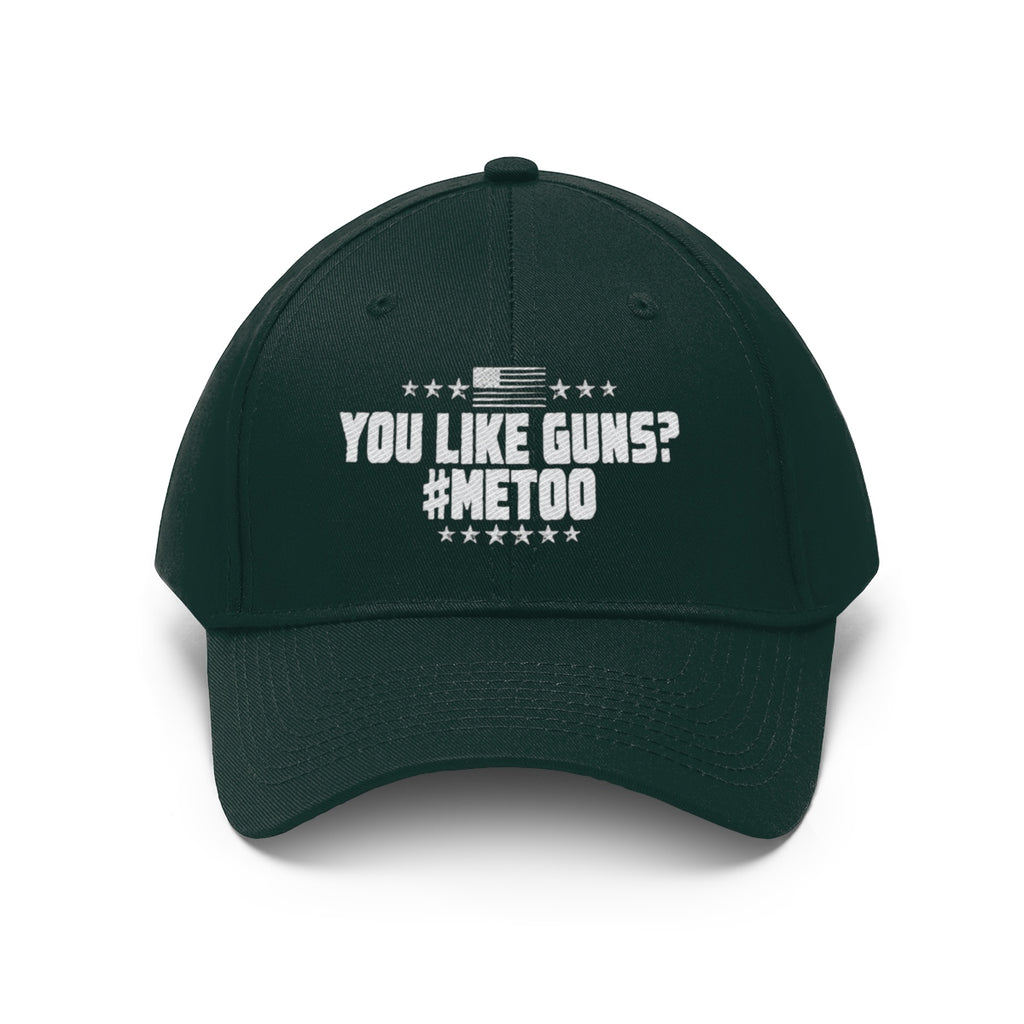 You Like Guns Me Too Twill Cap in dark green with a bold slogan and patriotic design.