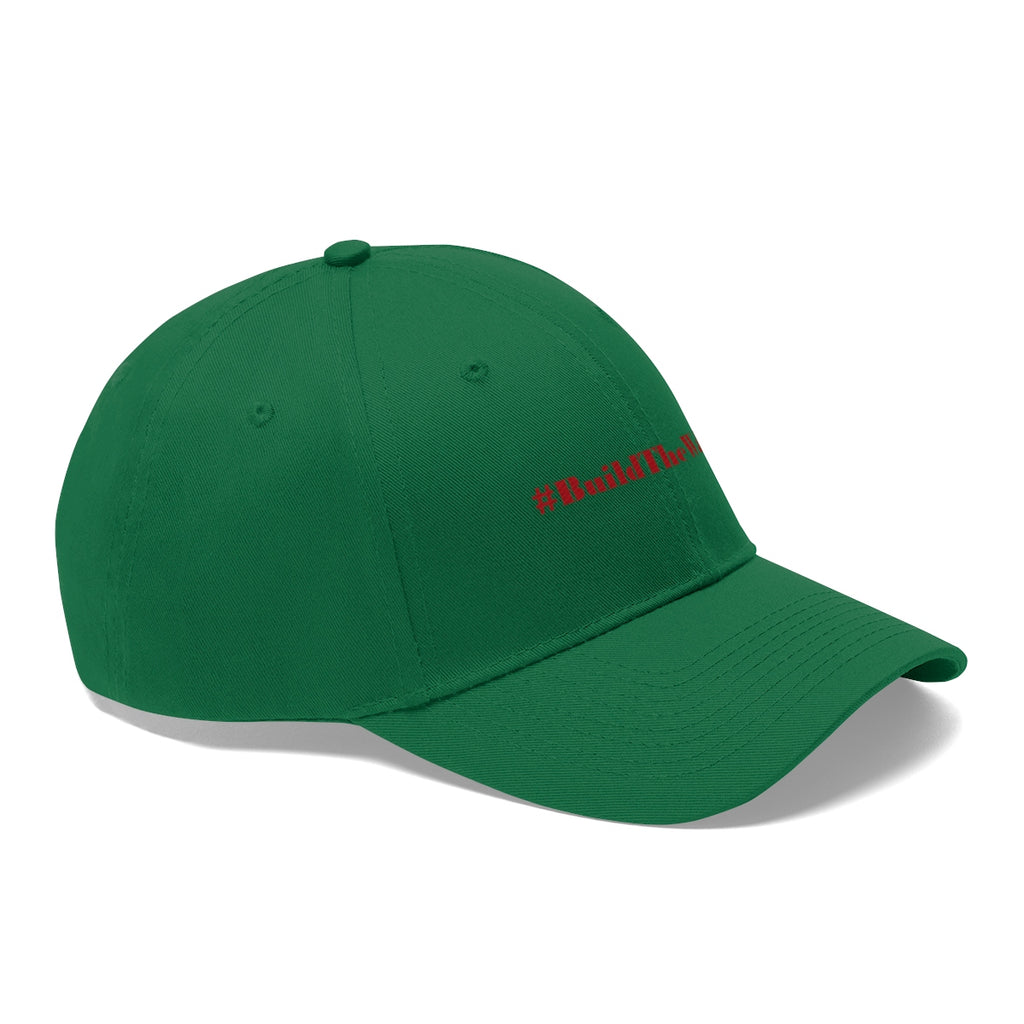 Build The Wall Twill Cap Political Statement Casual Cap in green with red hashtag text.