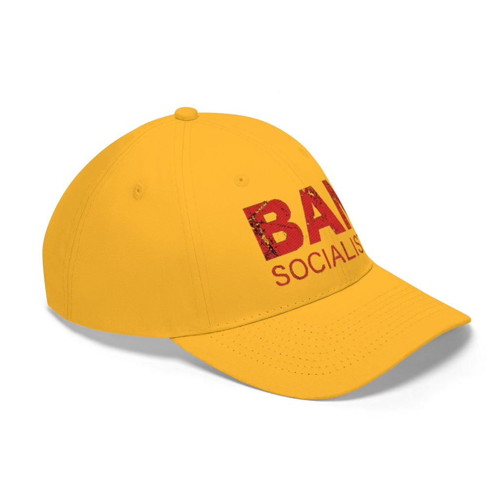 Ban Socialists Twill Cap Bold Message Graphic Cap in vibrant yellow with bold lettering.