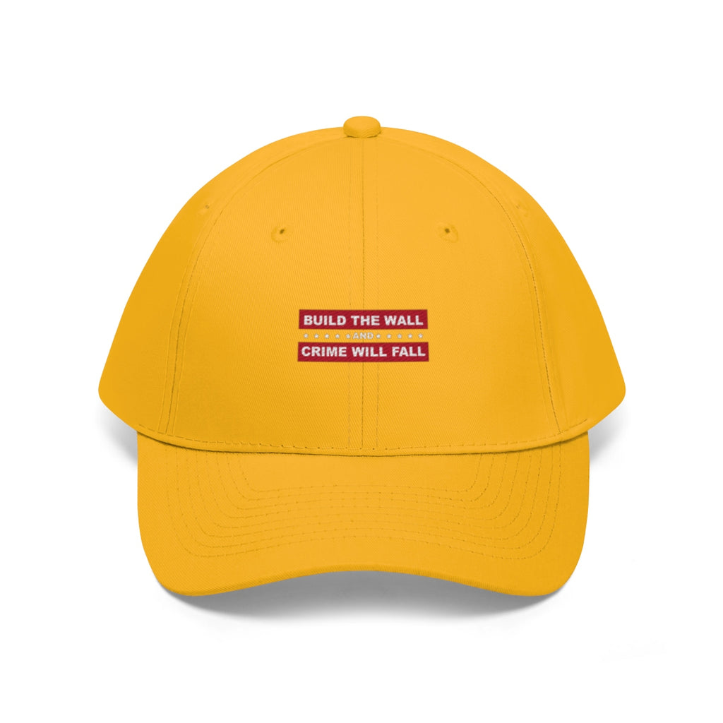 Build The Wall And Crime Will Fall Twill Cap in yellow with bold political message on the front.