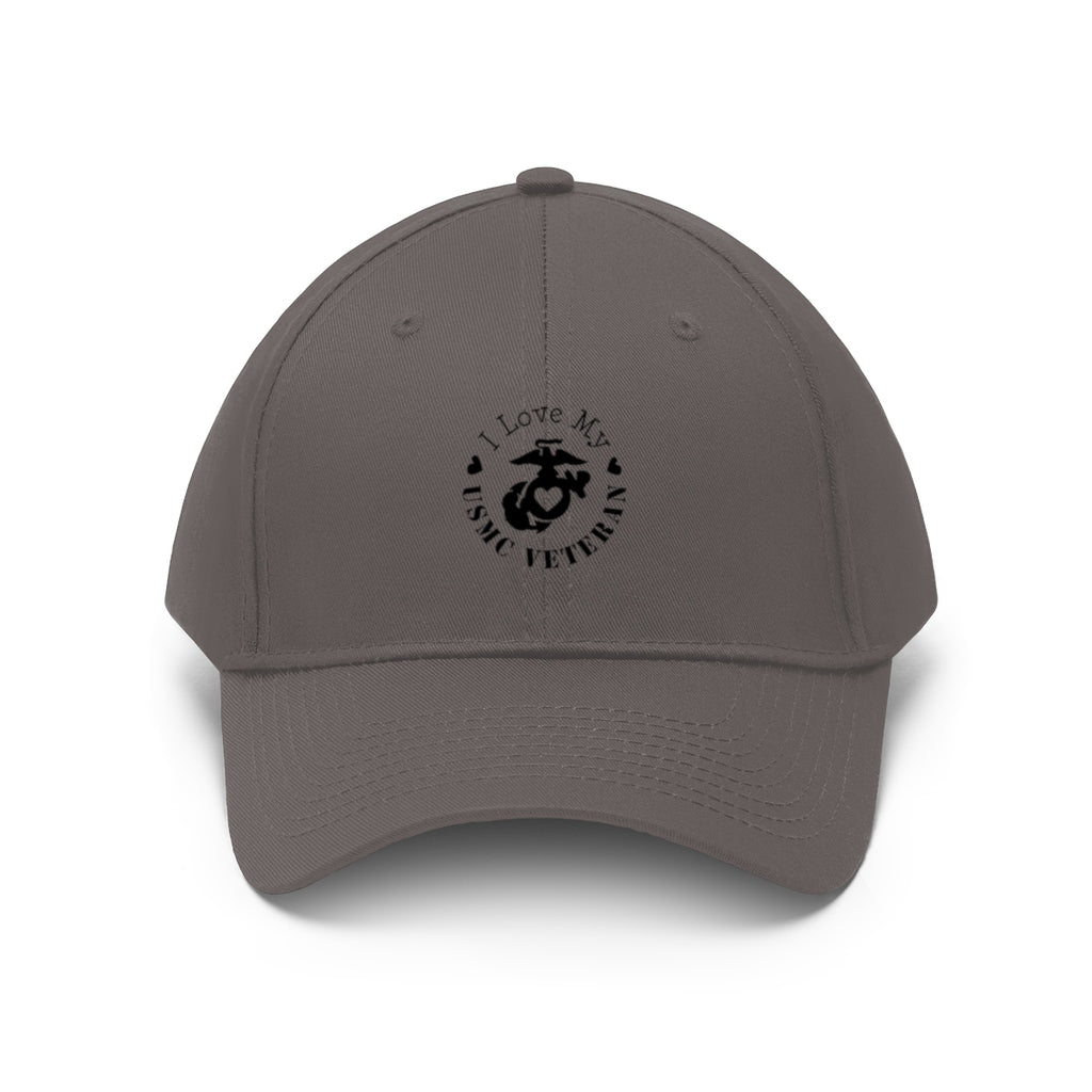 I Love My USMC Veteran Twill Cap featuring a logo and statement design on a gray cap.
