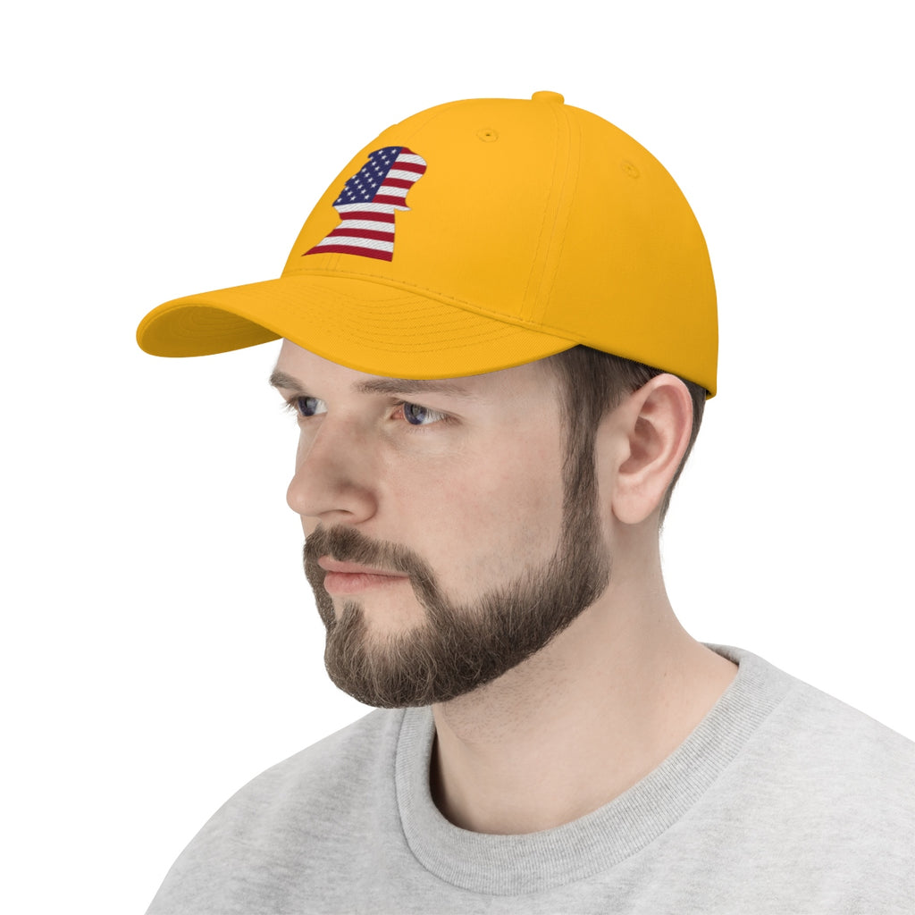 Trump American Flag SilhouetteTwill Cap displayed by a man wearing a yellow cap with an American flag design.