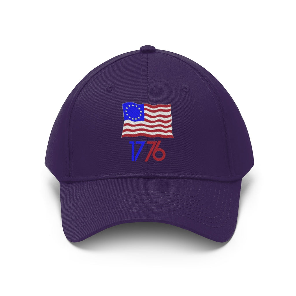 Betsy Ross Flag 1776 Twill Cap featuring American flag design and 1776 logo, symbolizing patriotism and classic style.