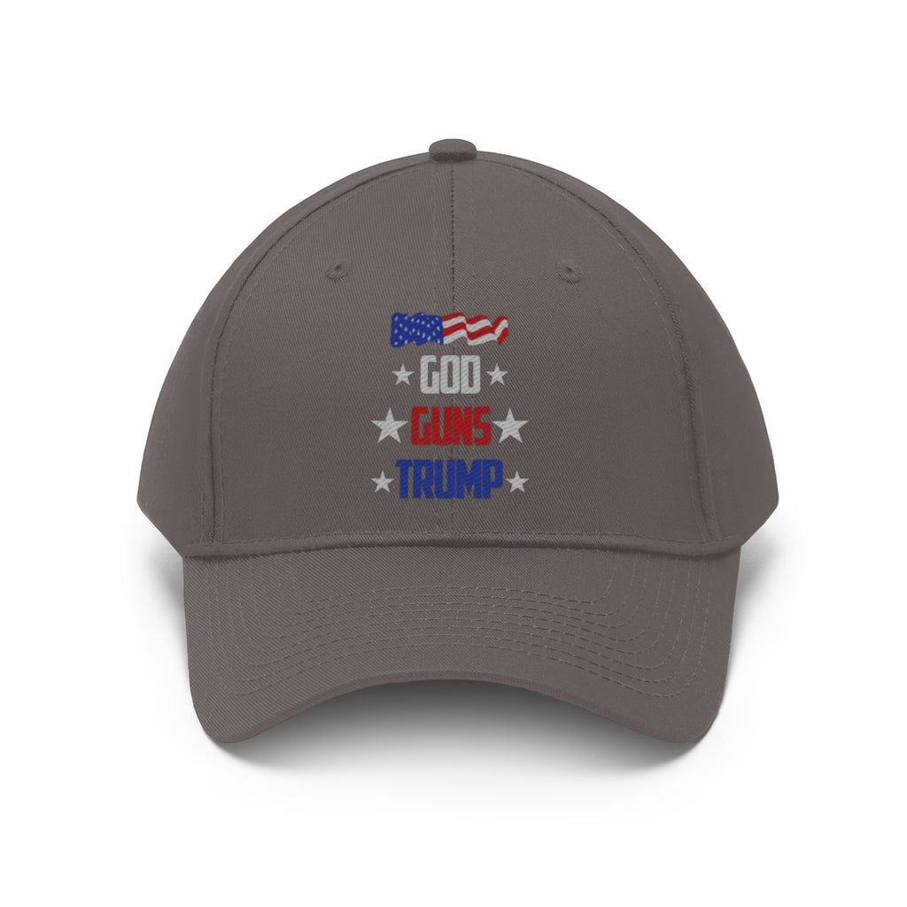 God Guns Trump Patriotic Twill Cap featuring American flag design on a gray background.