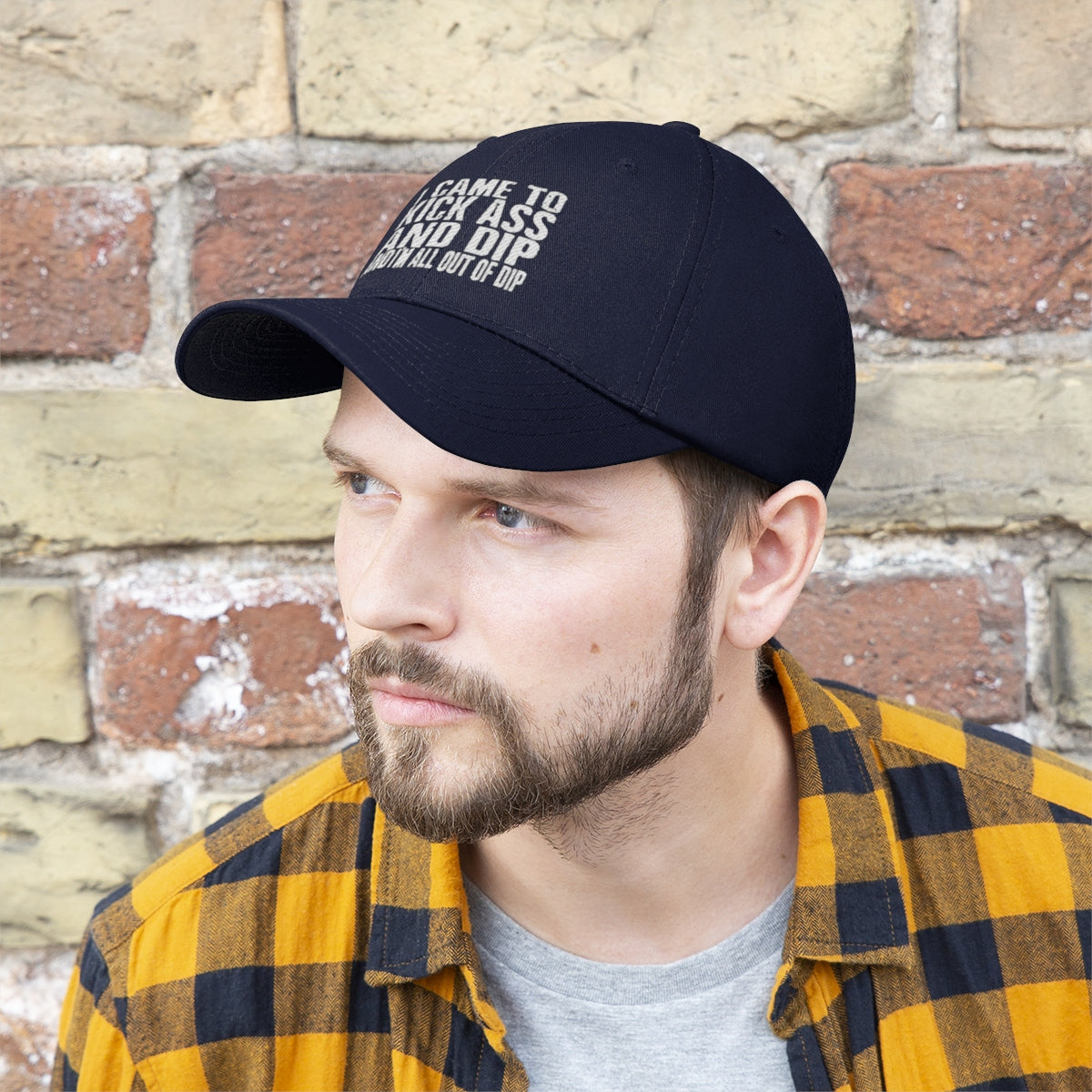 I Came To Kick Ass And Dip And I'm All Out Of Dip Twill Cap on a man with a beard and plaid shirt.