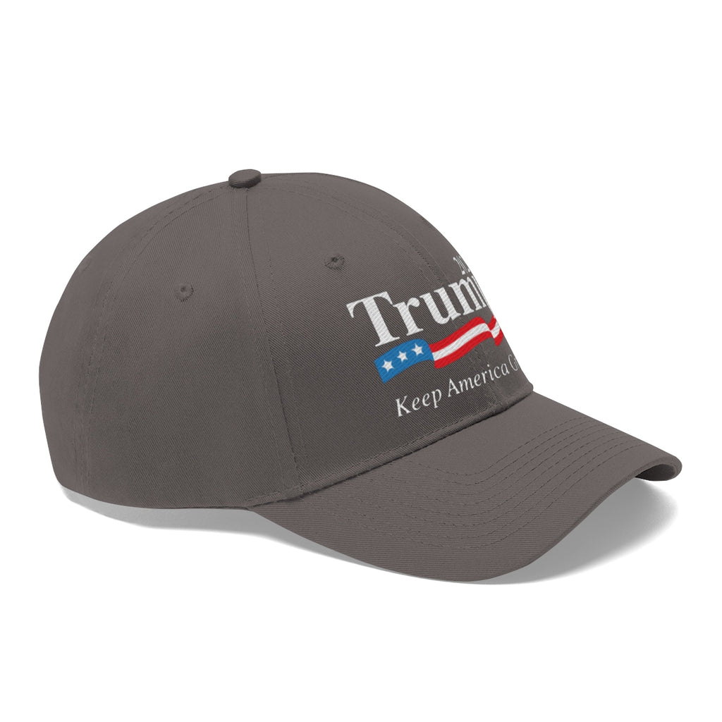 Trump 2020 Keep America Great Twill Cap in gray featuring bold text and American flag design.