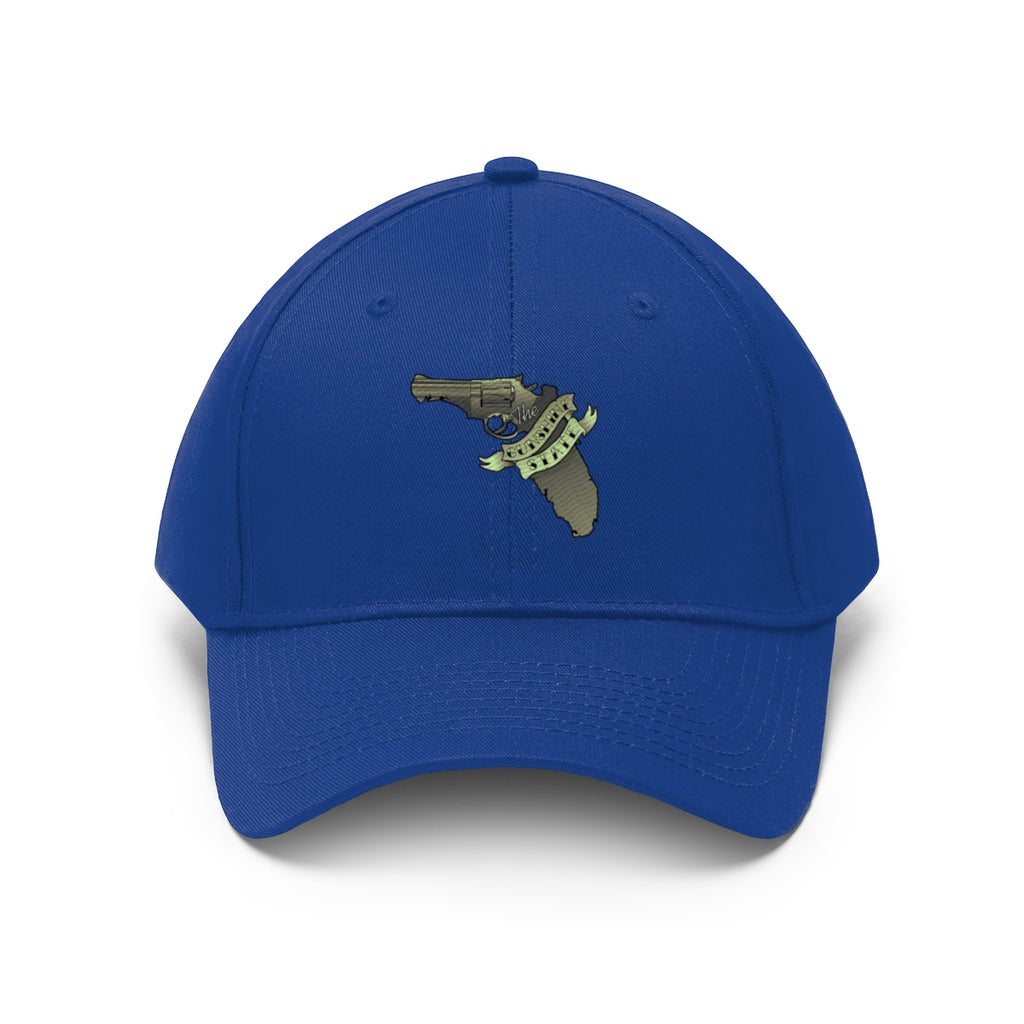 Florida The Gunshine State Twill Cap featuring a gun emblem on a blue cap.
