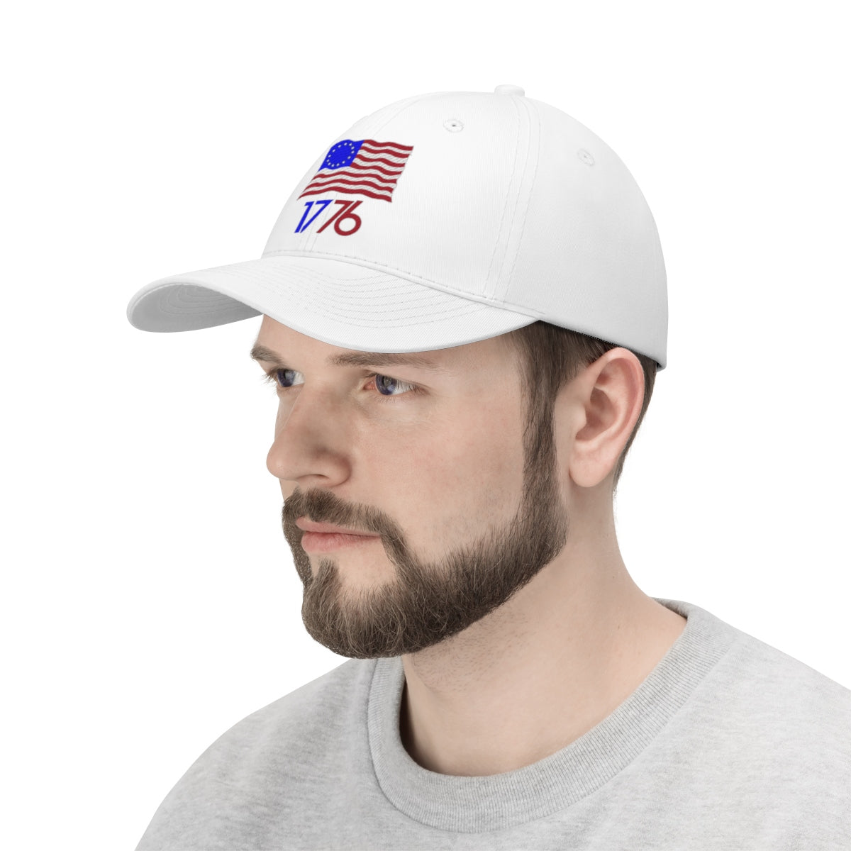 Side profile of a man wearing a white Betsy Ross Flag 1776 Twill Cap, featuring an embroidered flag and 1776 text.