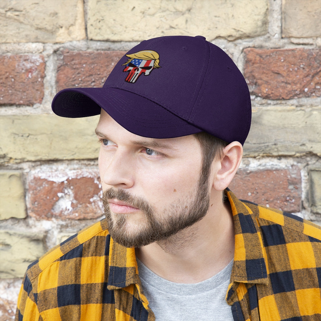 Man wearing a Classic Punisher Twill Cap with Trump Design in front of a brick wall.