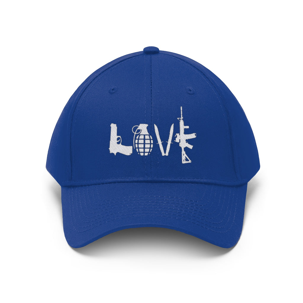Love Combat Inspired Street Style Twill Cap featuring a bold design with guns and grenade on a blue cap.
