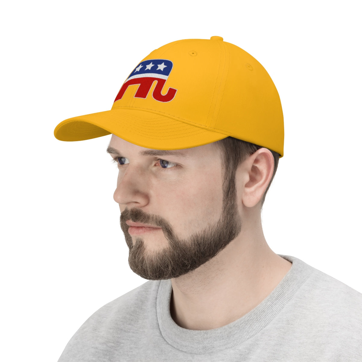 GOP Symbol Twill Cap Patriotic Political Graphic Cap worn by a man with a beard, featuring a yellow color and red elephant design.