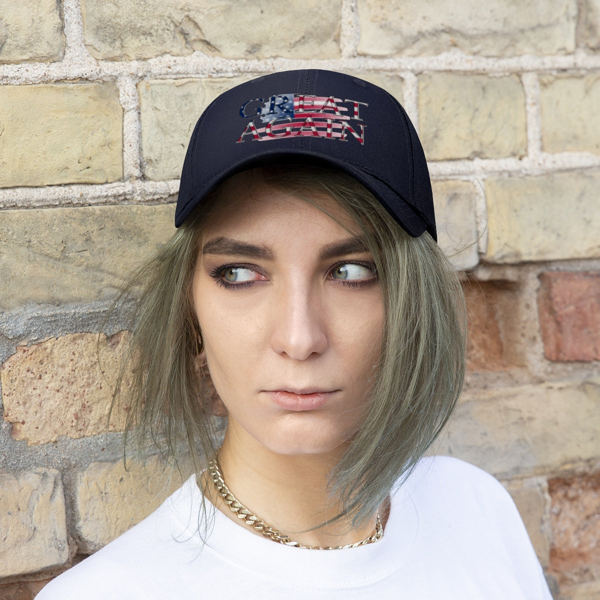 Great Again On Faded American Flag Twill Cap worn by a model with short hair against a brick wall.