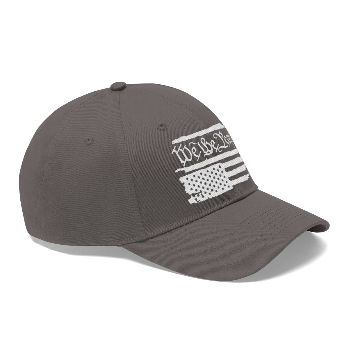 We The People On Distressed American Flag Twill Cap featuring a bold American flag design on a dark gray dad hat.