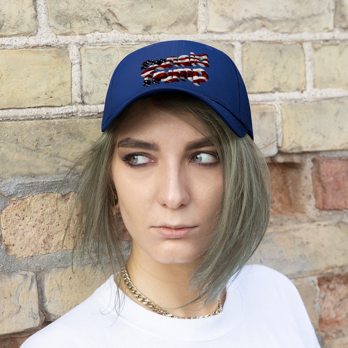 Donald Trump With American Flag Colors Twill Cap worn by a model against a brick wall, showcasing patriotic design.