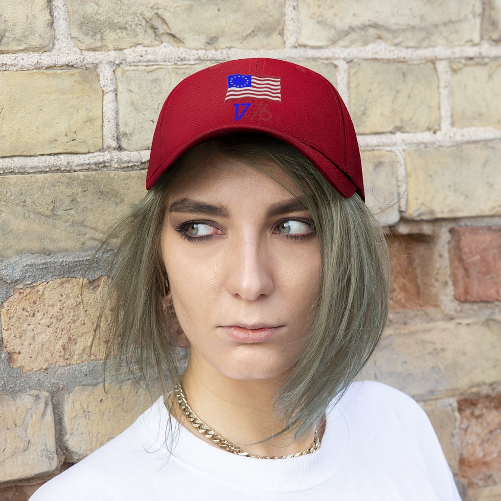 Woman wearing Betsy Ross Flag 1776 Twill Cap against brick wall