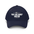 You Like Guns Me Too Twill Cap featuring bold text and patriotic design on a navy base.