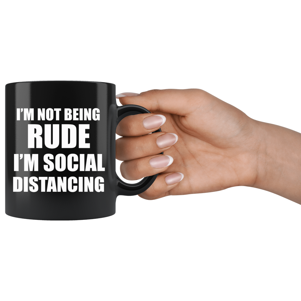 I'm Not Being Rude I'm Social Distancing humorous black mug held by a hand