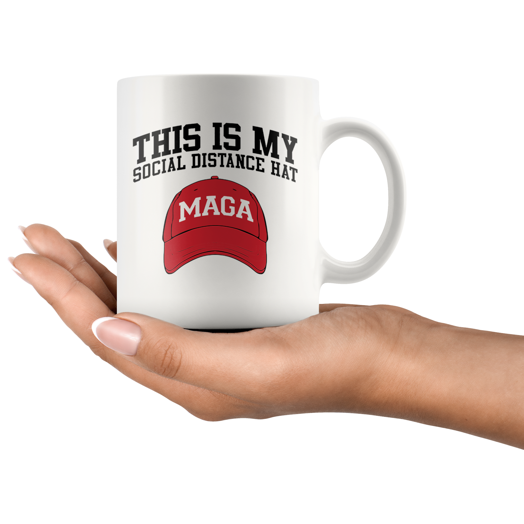 Hand holding a mug with 'This Is My Social Distance Hat MAGA' and red MAGA hat design.