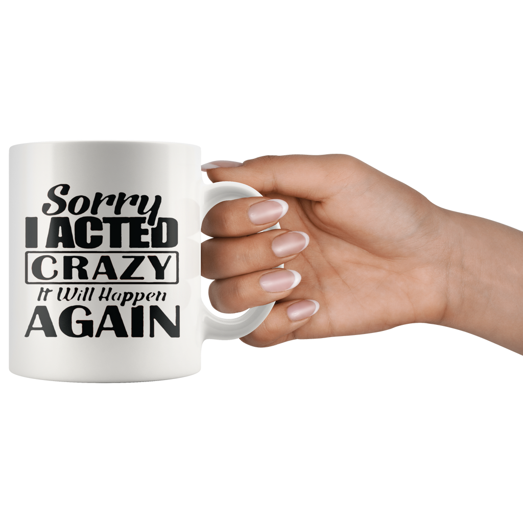 Hand holding a mug with Sorry I Acted Crazy Statement Design in bold text.
