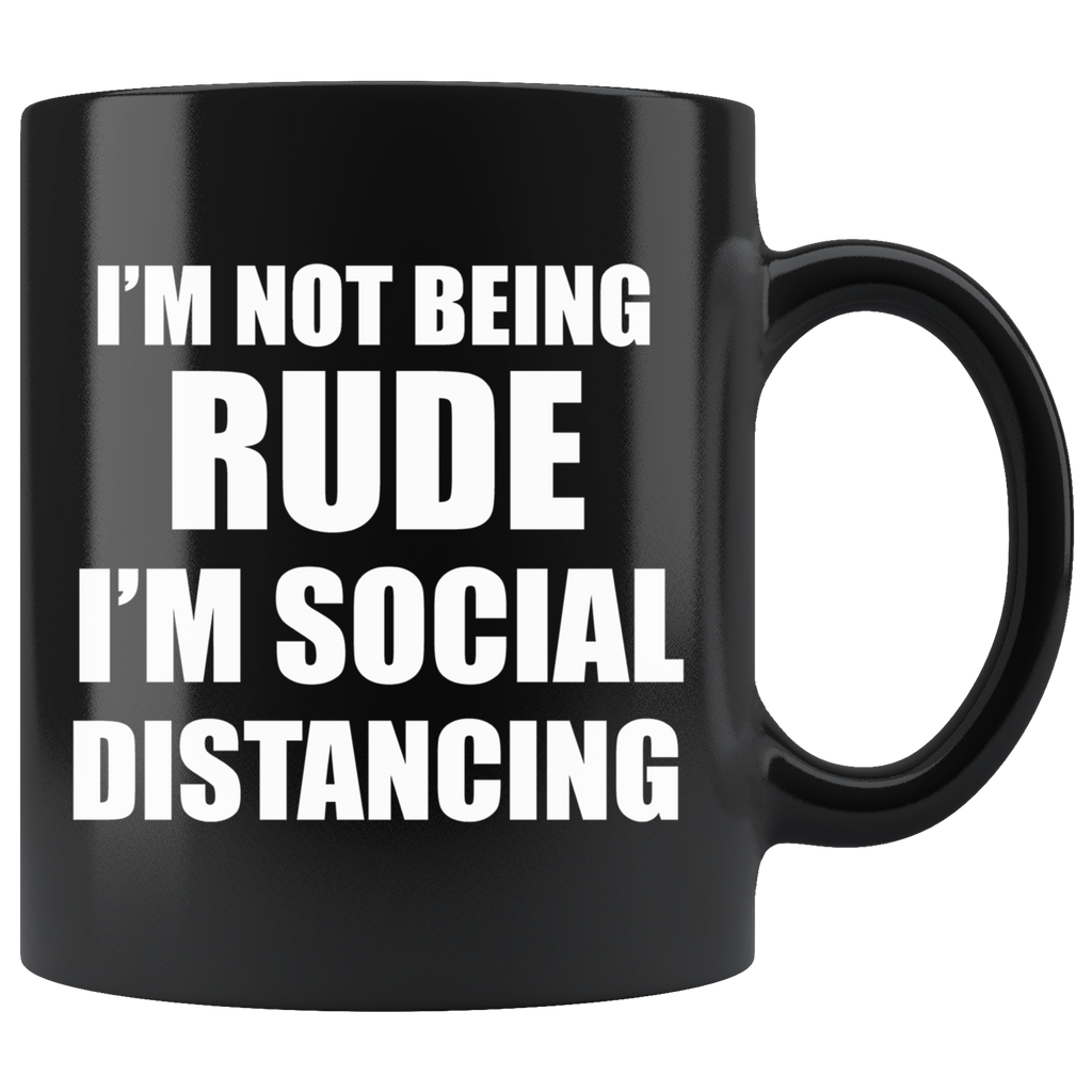 Black mug with humorous text "I'm Not Being Rude I'm Social Distancing" in bold white letters.